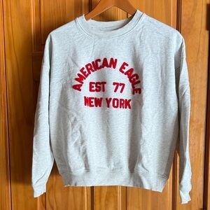 Women’s American Eagle Outfitters Light Gray Crewneck Sweatshirt with Red Logo